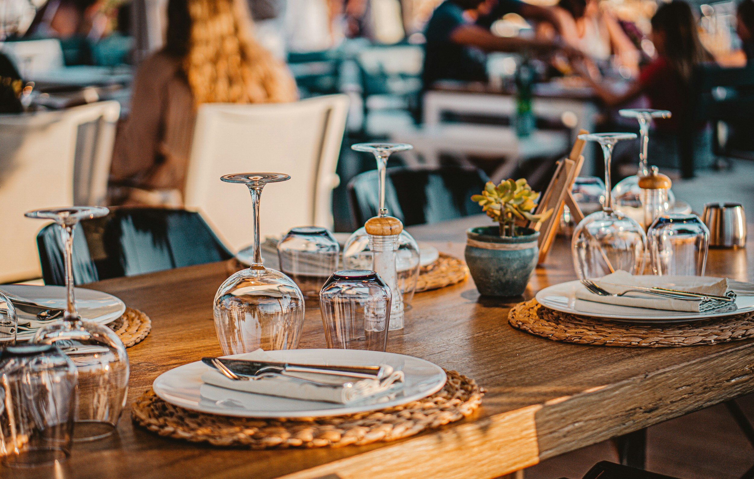 A restaurant dining room prepared for service